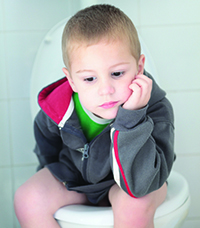 Boy on toilet