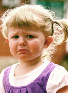 Girl having temper tantrum