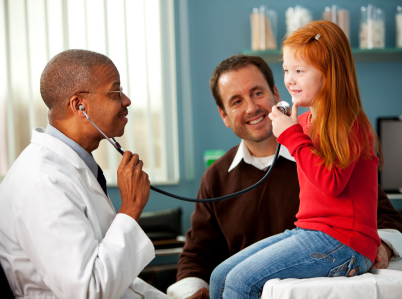 Doctor with parent and child