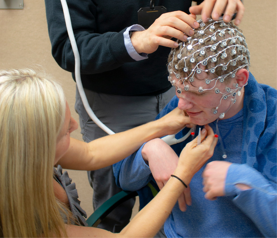 photo of young man with autism having an eeg